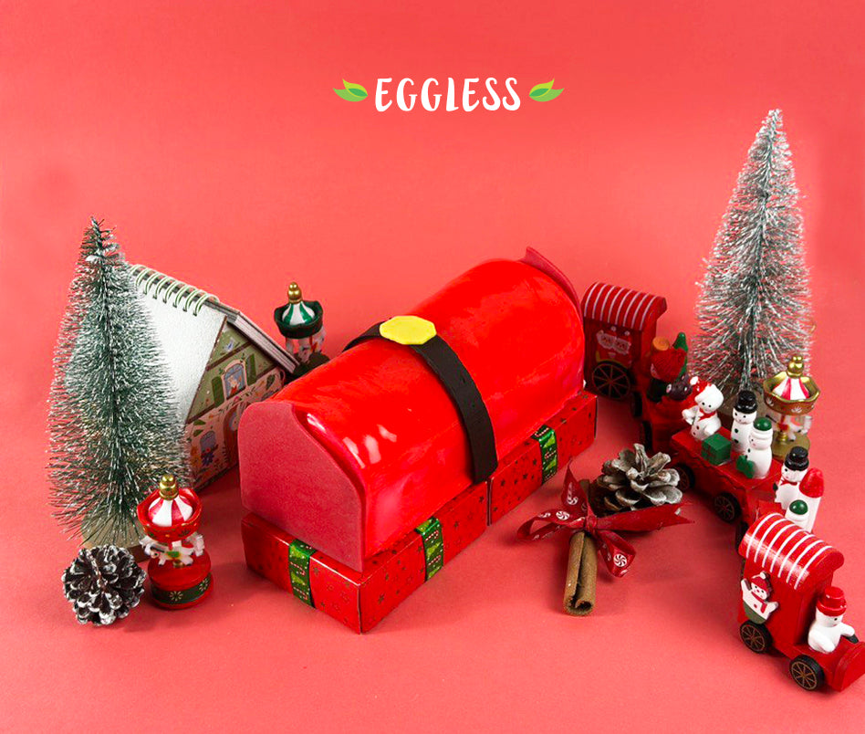 Santa’s Belt (Eggless Strawberry Mango Log)